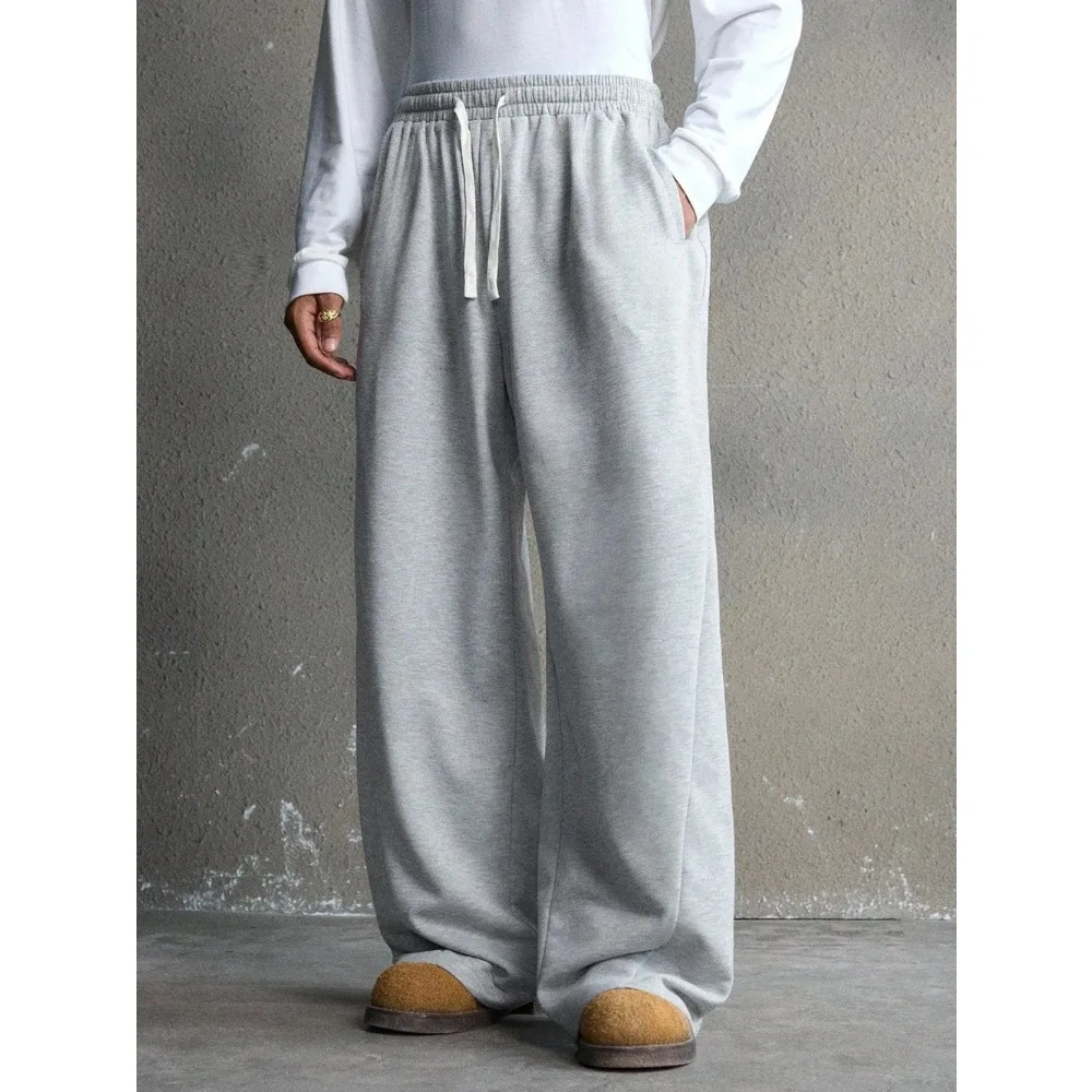 Męskie spodnie dresowe na co dzień, do dojazdów do pracy, proste, jednokolorowe, ze sznurkiem w pasie, z kieszeniami skośnymi, luźne, z szerokimi nogawkami, z czystej bawełny, casualowe.