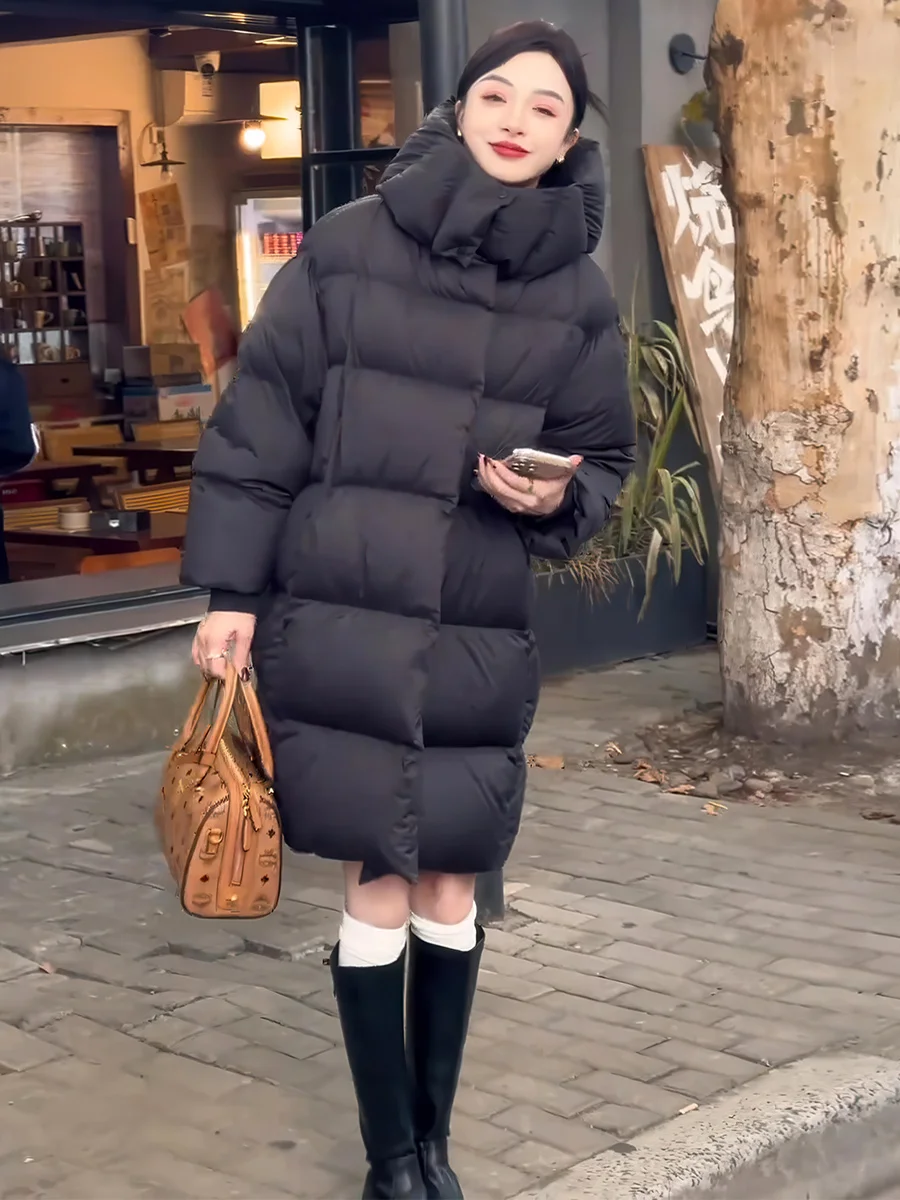 

Korean Sle Women's Loose Fit Hooded down Jaet Bla Warm Bread Coat Medium Length Zipper Closure Pure Color Long Sve