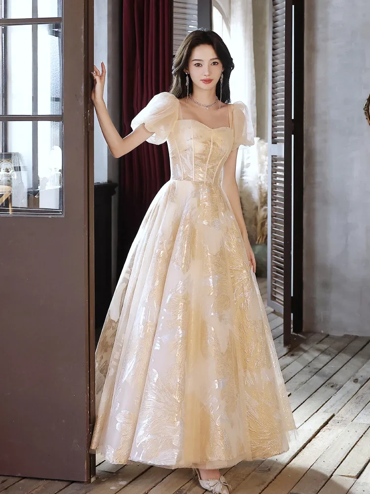 

French evening dress for women with a high-end and luxurious light gauze champagne colored gauze skirt