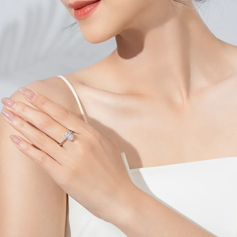 Wunderschöner, glänzender, schlichter Verlobungsring mit ovalen Zirkonia-Steinen (1-8 Karat) für Damen, ideal für Jahrestage und Partys, luxuriöser Schmuck von hoher Qualität. – Detail 4