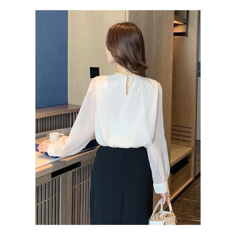 بلوفر نسائي جديد مخيط موديل 2025 بفيونكة موضة بلون سادة قمصان فضفاضة متعددة الاستخدامات غير رسمية بأكمام طويلة