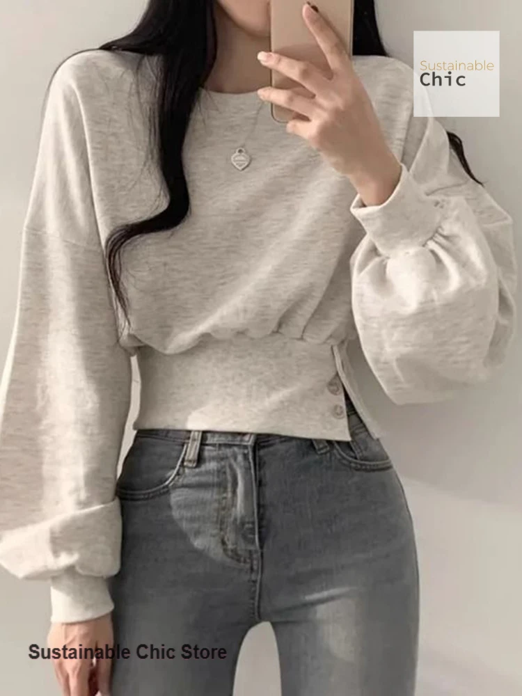 Korean-style fashion design sense round neck button waist slim long-sleeved top women's autumn and winter short pullover sweater