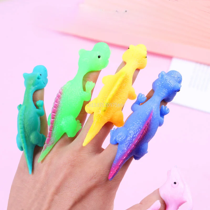 

Creative Dinosaur Finger Toys Kids Funny Cartoon Animals Anxiety Stress Relief Shooting Playing Toy Slingshot Catapult Game