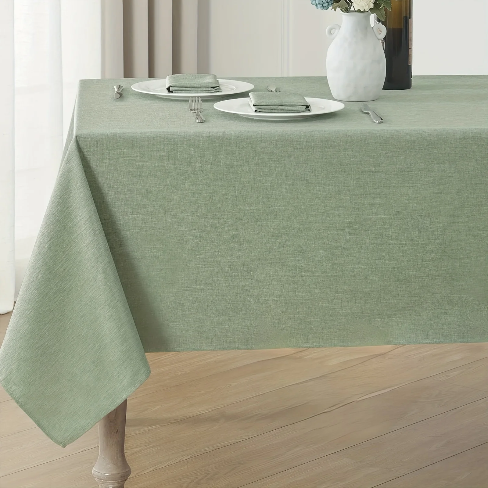 One item: Sage green tablecloth, a rectangular simple-style tablecloth