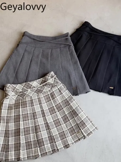 

Весенне-летняя новая плиссированная короткая юбка с высокой талией, элегантная, стройнящая, в японском стиле, универсальная, подчеркивающая фигуру, мини-юбка.