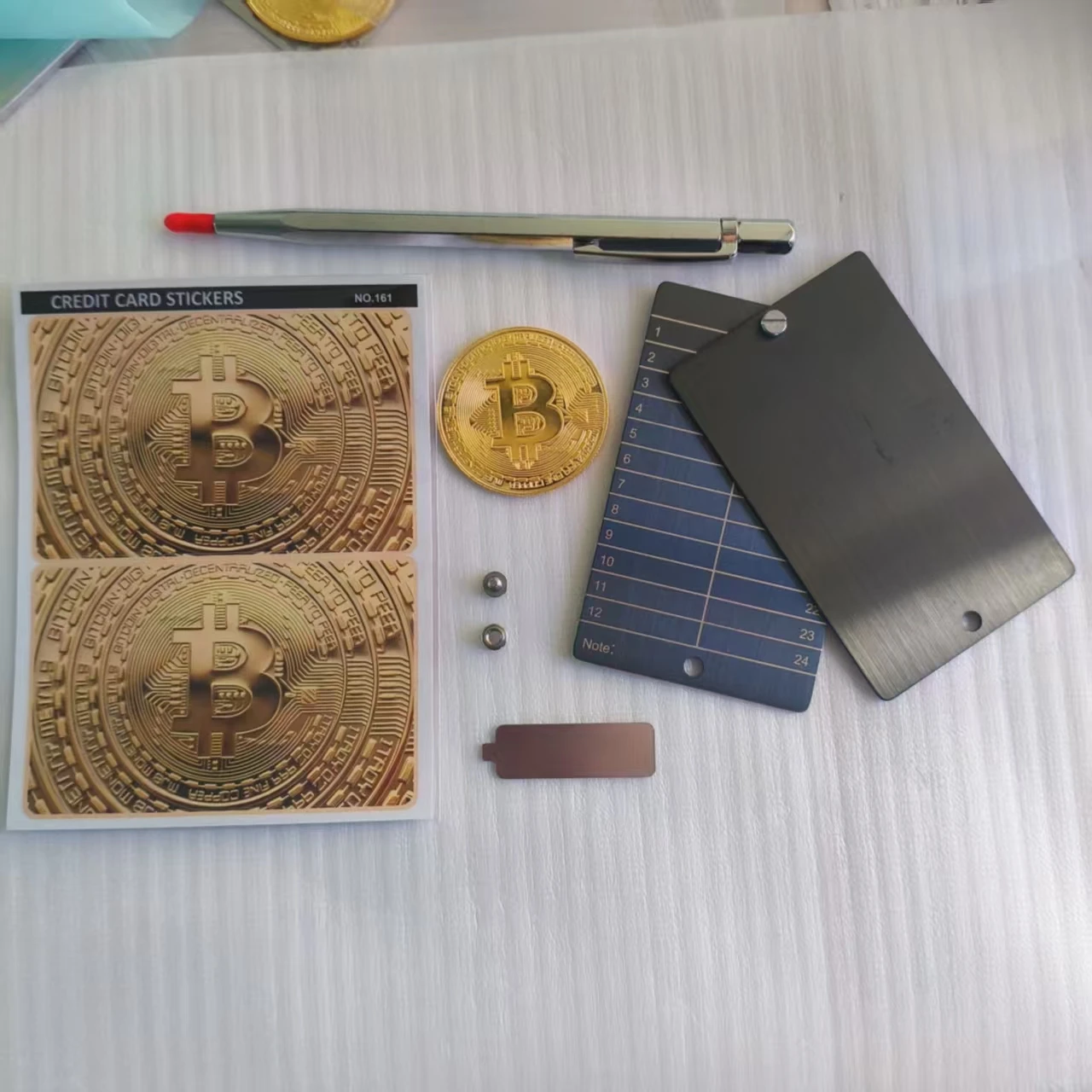 7-Piece Bitcoin Cryptocurrency Password Book Set (2 Stickers/2 Stainless Steel Password Books/1 Iron Bitcoin/1 Stainless Steel T