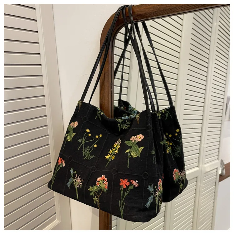 Bestickte Einkaufstasche mit großer Kapazität Frauen Sommer trend ige Stoff tasche Nische Stickerei Umhängetasche Textur Beutel tasche Segeltuch tasche