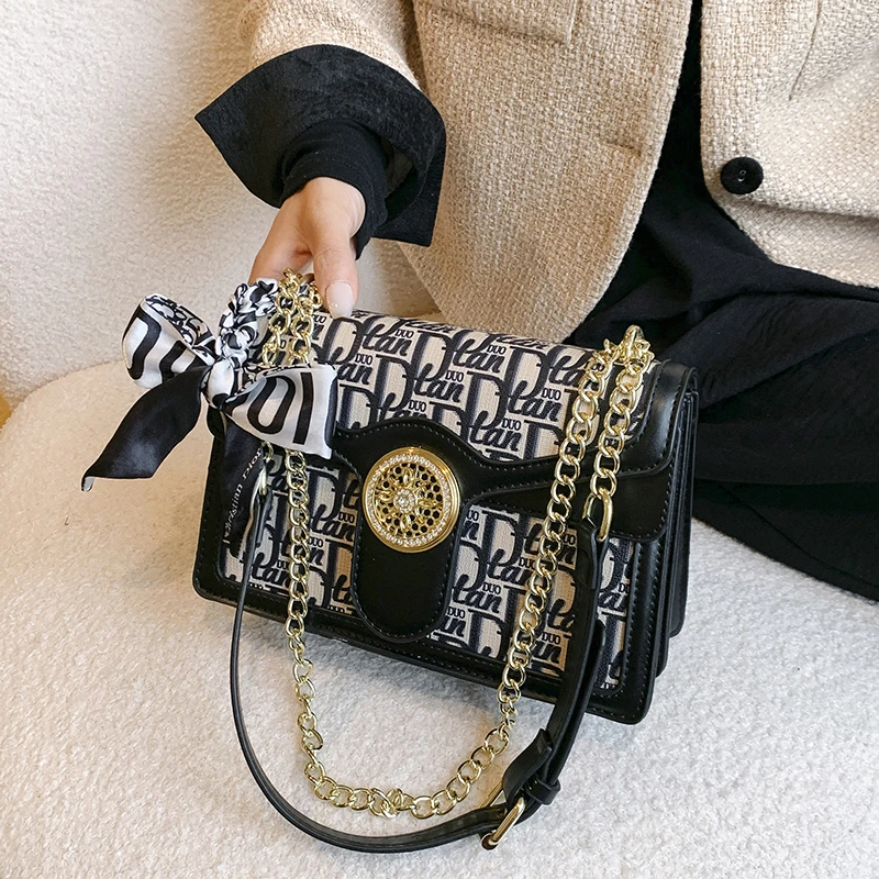

​​Chic Understated Female Bag Handbag Petite Clutch Bag Quiet Confidence For Discerning Tastes​​