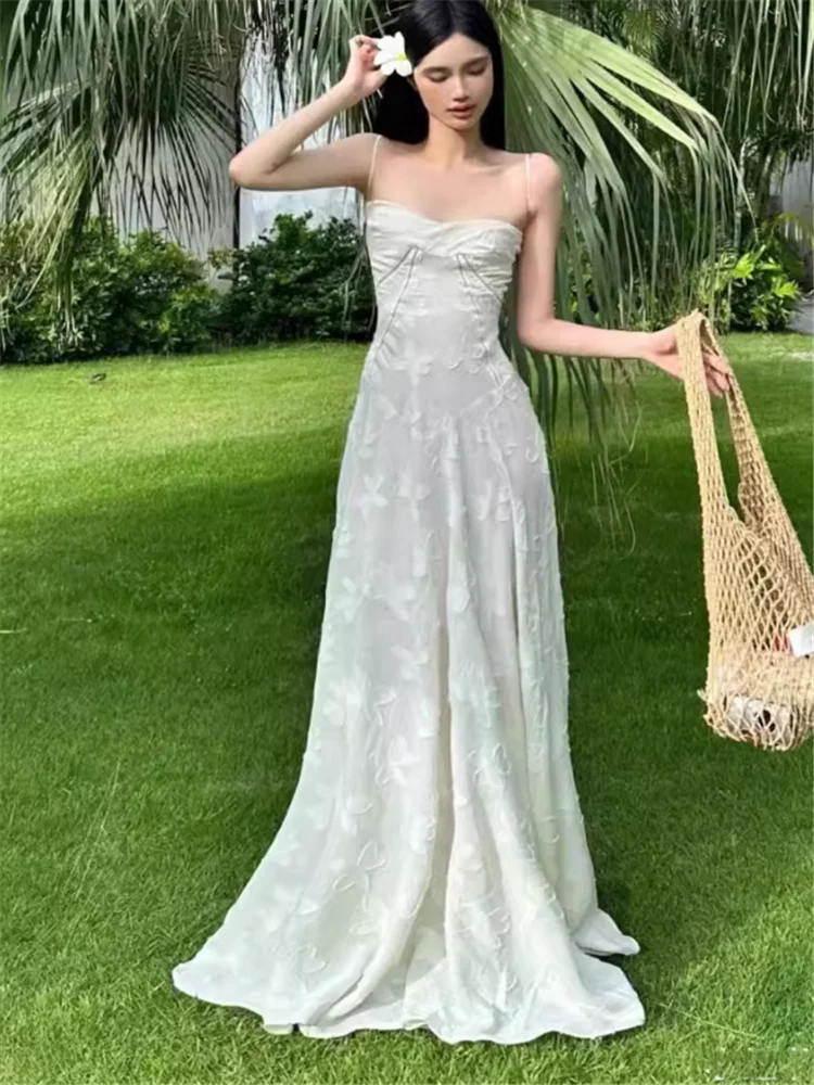 عطلة نمط الجنية الأبيض الوردي الأشرطة المطرزة فستان طويل الفرنسية الجديدة الصيف الجوف شاطئ شاطئ البحر منتجع ألف خط فستان الصور