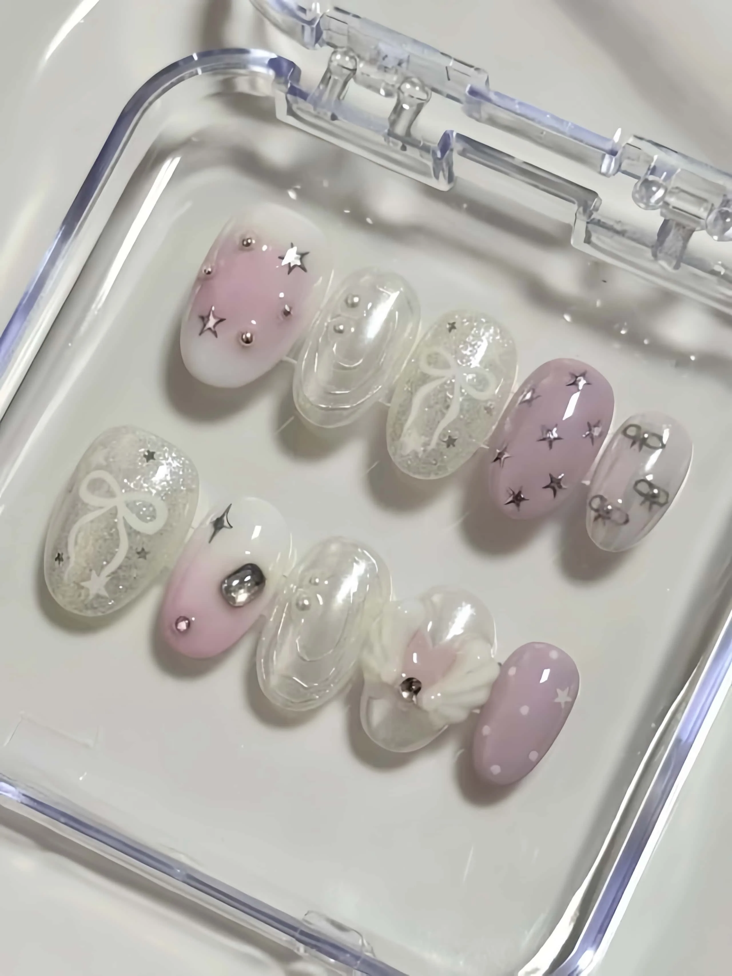 【Exquisitely Crafted, High-Quality Handmade Items】10 Pieces of Handmade Almond-Shaped Full-Cover Nail Tips, Medium-Length, with Light Purple Pink Gradient Base Color, Paired with Glitter, Hand-Painted Bow, Silver Star Embellishments, and 3D Flower Decorations, Hand-Polished for a Smooth Finish, Gentle Ballet Girl Style, Suitable for Women and Girls, Perfect for Summer Vacations, Graduation Season, and as a Gift, Comes with 1 Piece of Jelly Glue and 1 Nail File