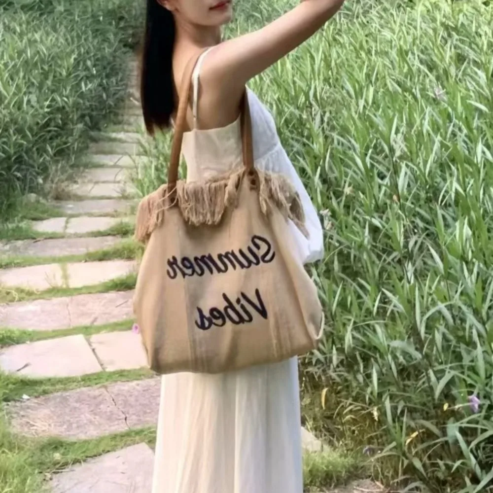 

Large-capacity literary and leisure tote bag women's summer new fashion trendy woven bag high-end shoulder bag