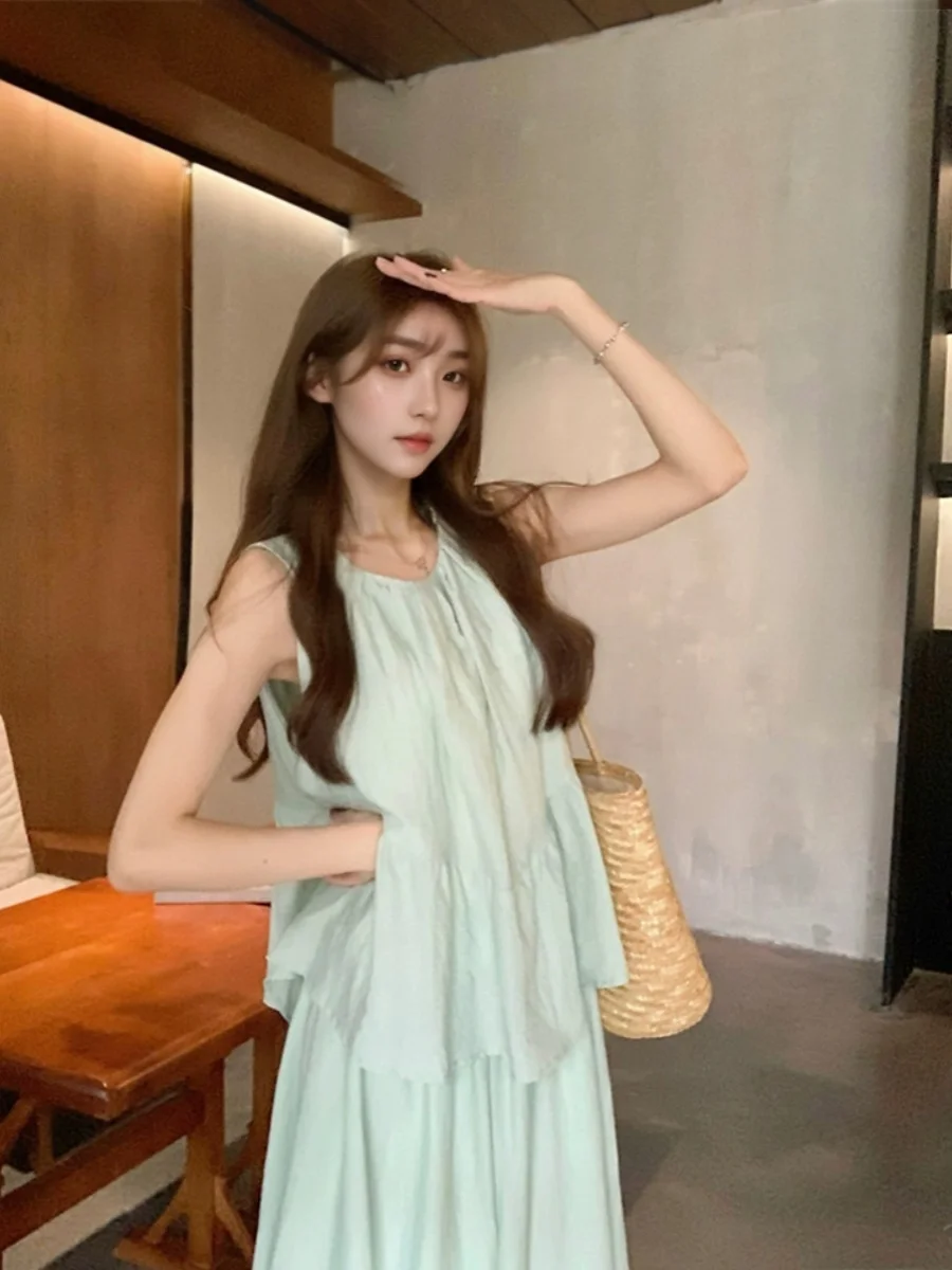 

Water Blue Doll Shirt Sleeveless Vest Half Skirt Two Piece Set for Young Women Summer Fashion round Neck Pullover Ensemble