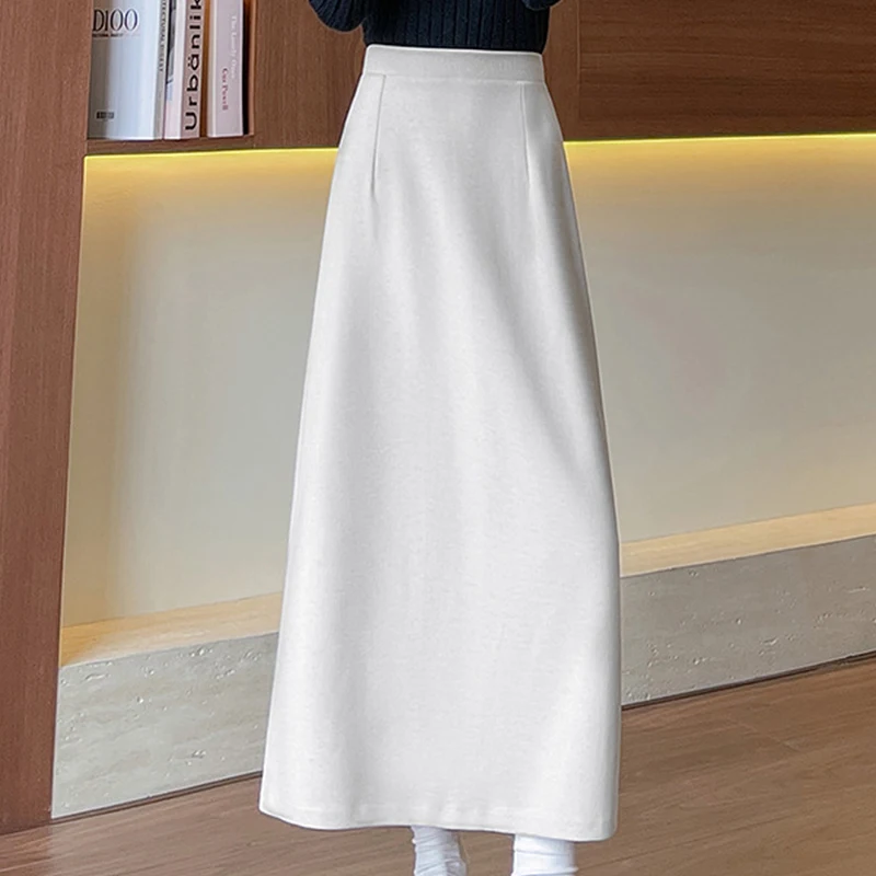 Długie spódnice damskie z wysokim stanem na jesień i zimę 2025, nowe, jednolite, uniwersalne spódnice w kształcie litery A z rozcięciem z tyłu.