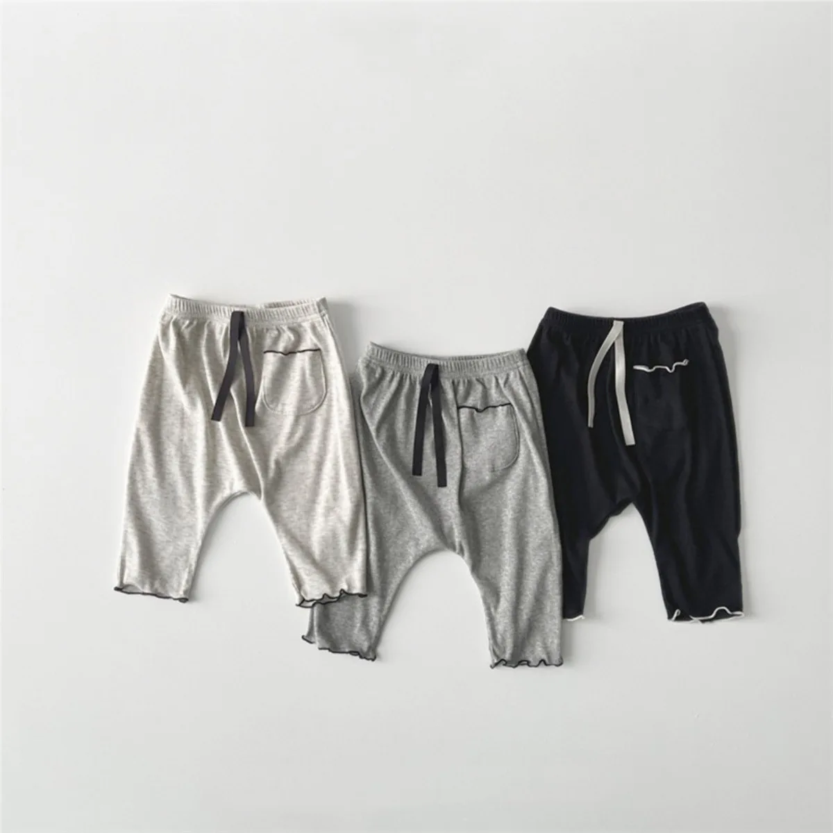 

2025 Autumn New Baby Girl Cotton Leggings Solid Soft Versatile Infant Boy Pocket Trousers Toddler Casual Pants Baby Clothes