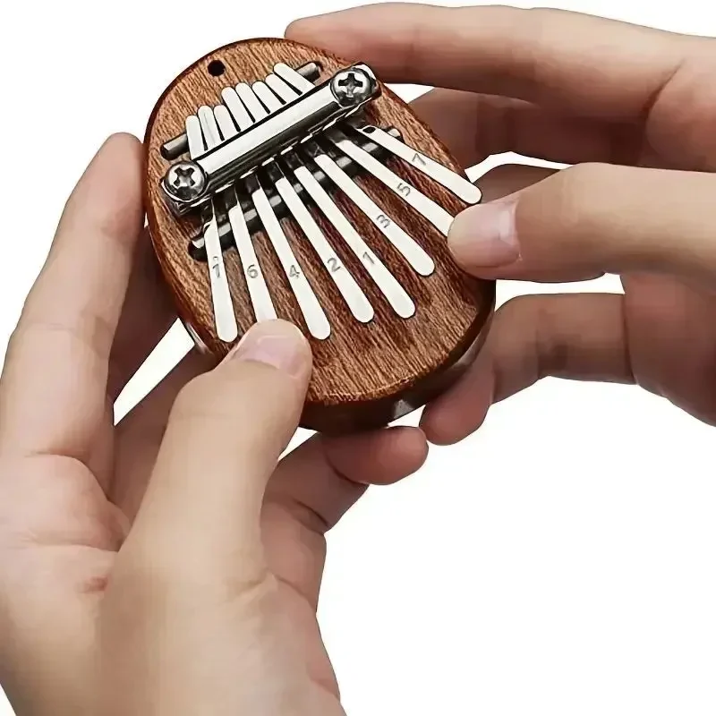 Portable Beginner Finger Piano Wooden Mini Thumb Piano Music Toy with 8 Tones Can Be Used for Home Decoration Birthday Gifts