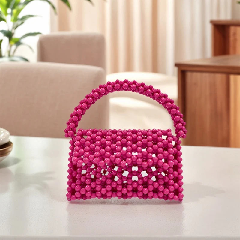 

Fashionable and personalized European and American hollow handmade bead retro triangle woven acrylic candy colored handbag