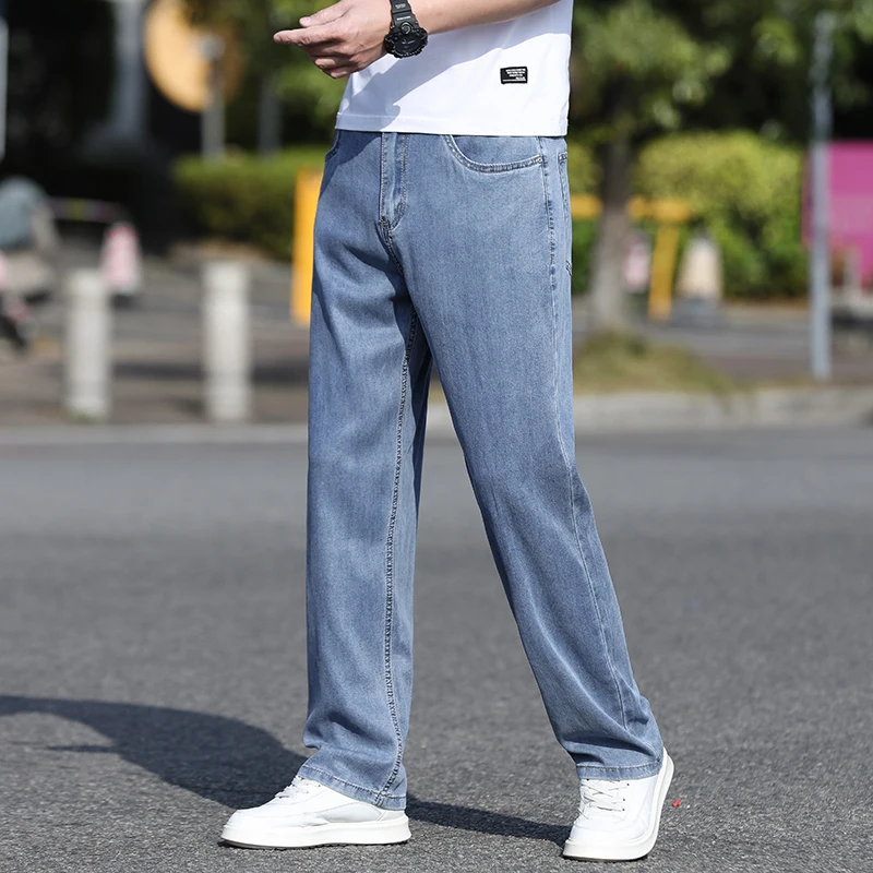 Jeans sottili di seta del ghiaccio 2024 primavera e l'estate nuovi pantaloni lunghi Casual sportivi dritti larghi 6837b da uomo