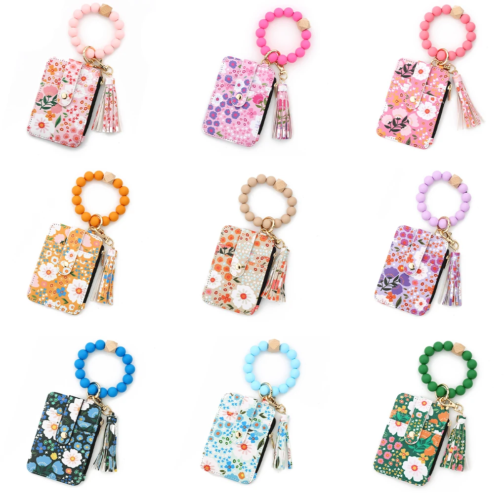 

2024 New Silicone Bead BraceletPrint Silicone Bead Bracelet PU Leather Tassel Womens Wallet Key Wrist Keychain Pendant