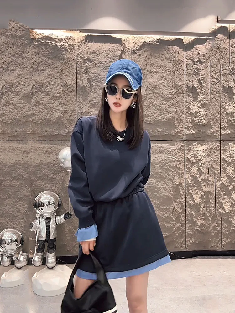 

European women in the spring of 2025 new color blocking round neck pullover versatile short skirt casual two-piece set