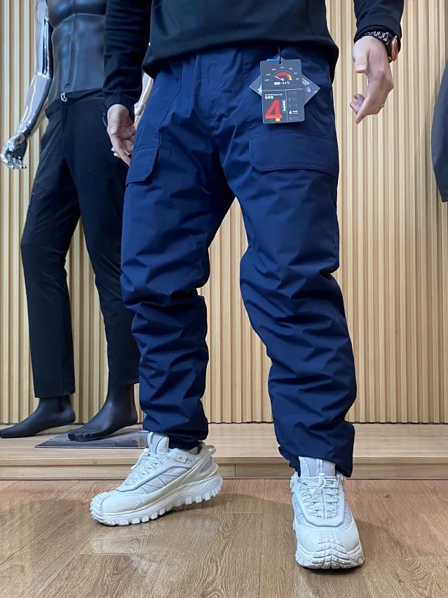 الدفء تعكس في الهواء الطلق الرجال أسفل السراويل 90 الأبيض Du أسفل الشتاء في الهواء الطلق طماق الشباب السراويل الطويلة غير رسمية ألياف البوليستر