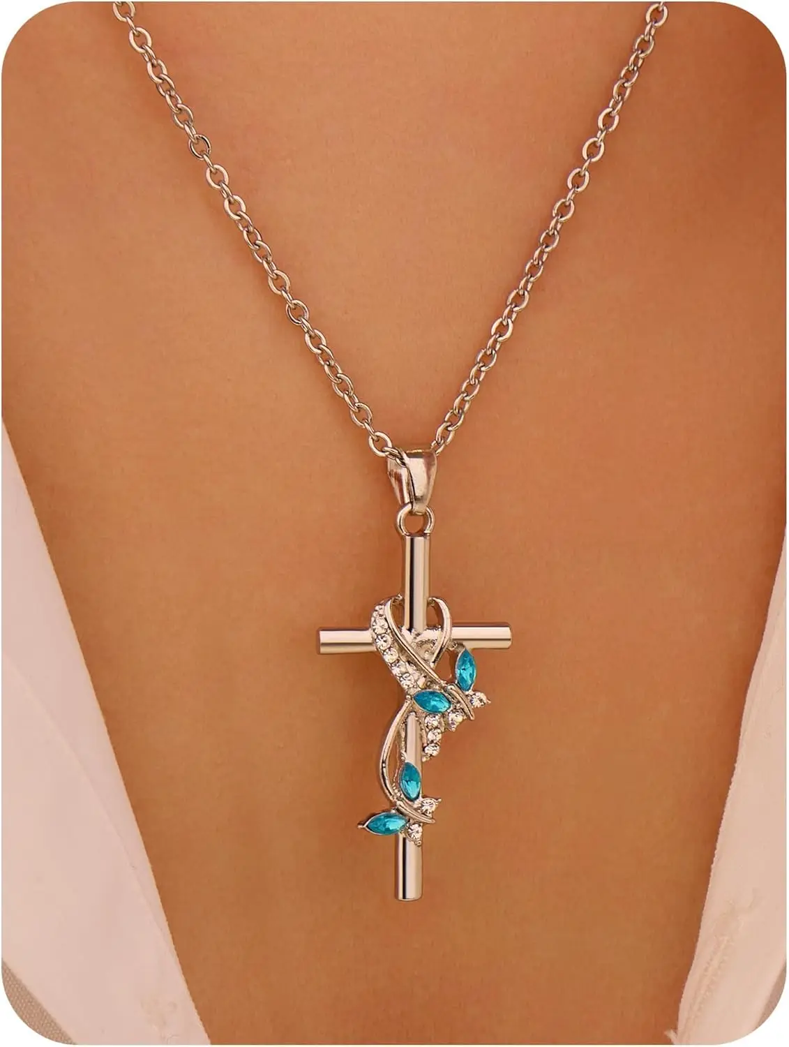 Collar con colgante de cruz plateada con lazo, adornado con encantadoras piedras preciosas azules, para mujer, regalo del Día de la Madre
