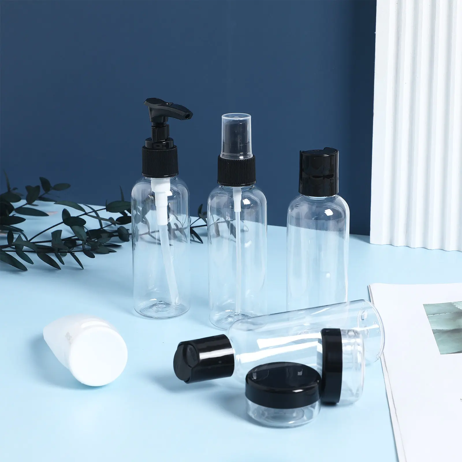 Compact Spray-and-Pump Toiletry Bottle Kit