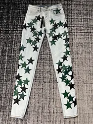 men allover green star patches distressed jeans
