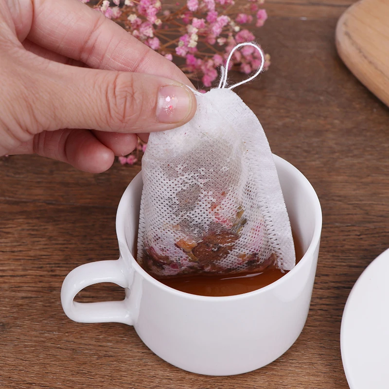 100 buah/lot kantong teh Infuser dengan tali menyembuhkan segel 7x9cm tas Filter Sachet