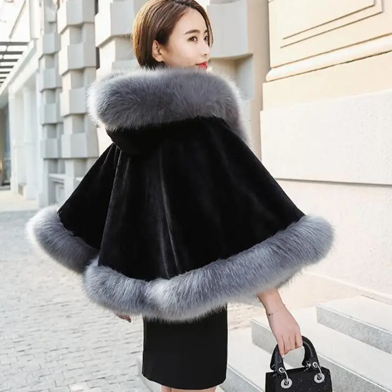 Women Imitation Cape Shawl Coat with Cap Short Poncho Cloak Parka Hooded Winter Collection Faux Fur Coat Women Fluffy Jacket