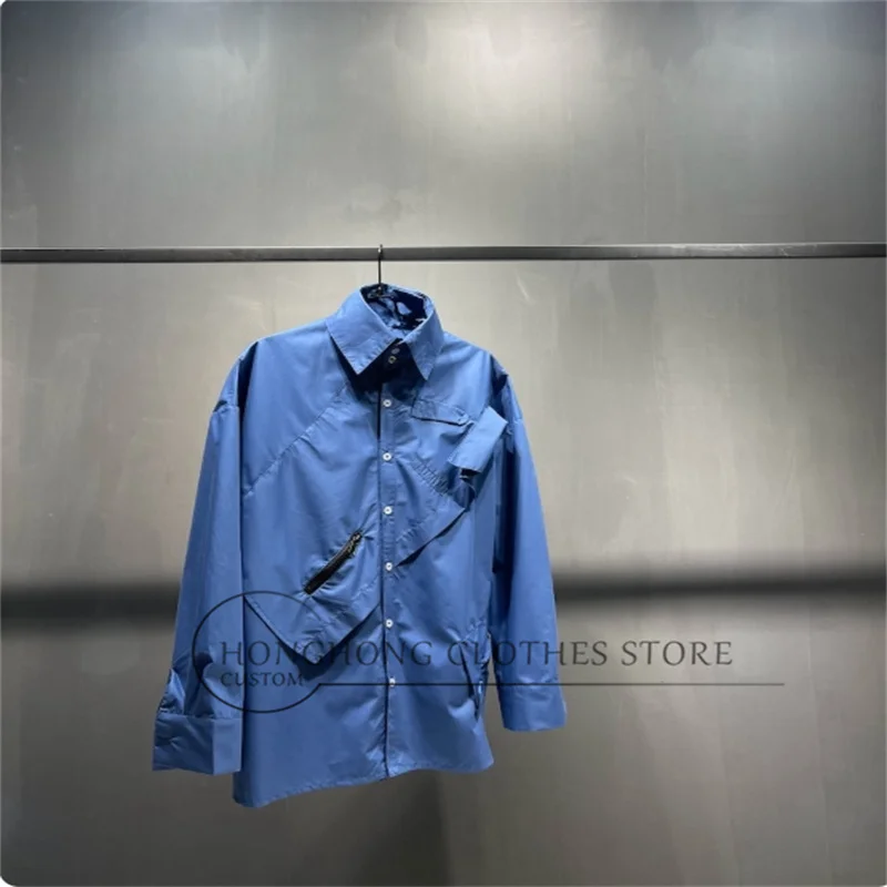 

Original deconstructed design navy blue long-sleeved shirt; custom three-dimensional tailored loose and wide-fit coat