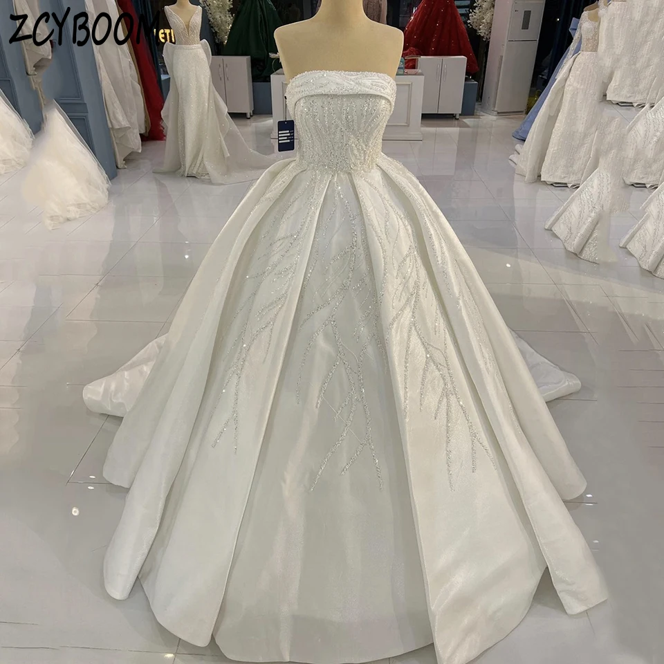 

Customized Strapless Sequin Sleeveless Wedding Dress 2025 Ball Gown Floor Length Sweep Train Stain Lace Up For Women Bridal Gown