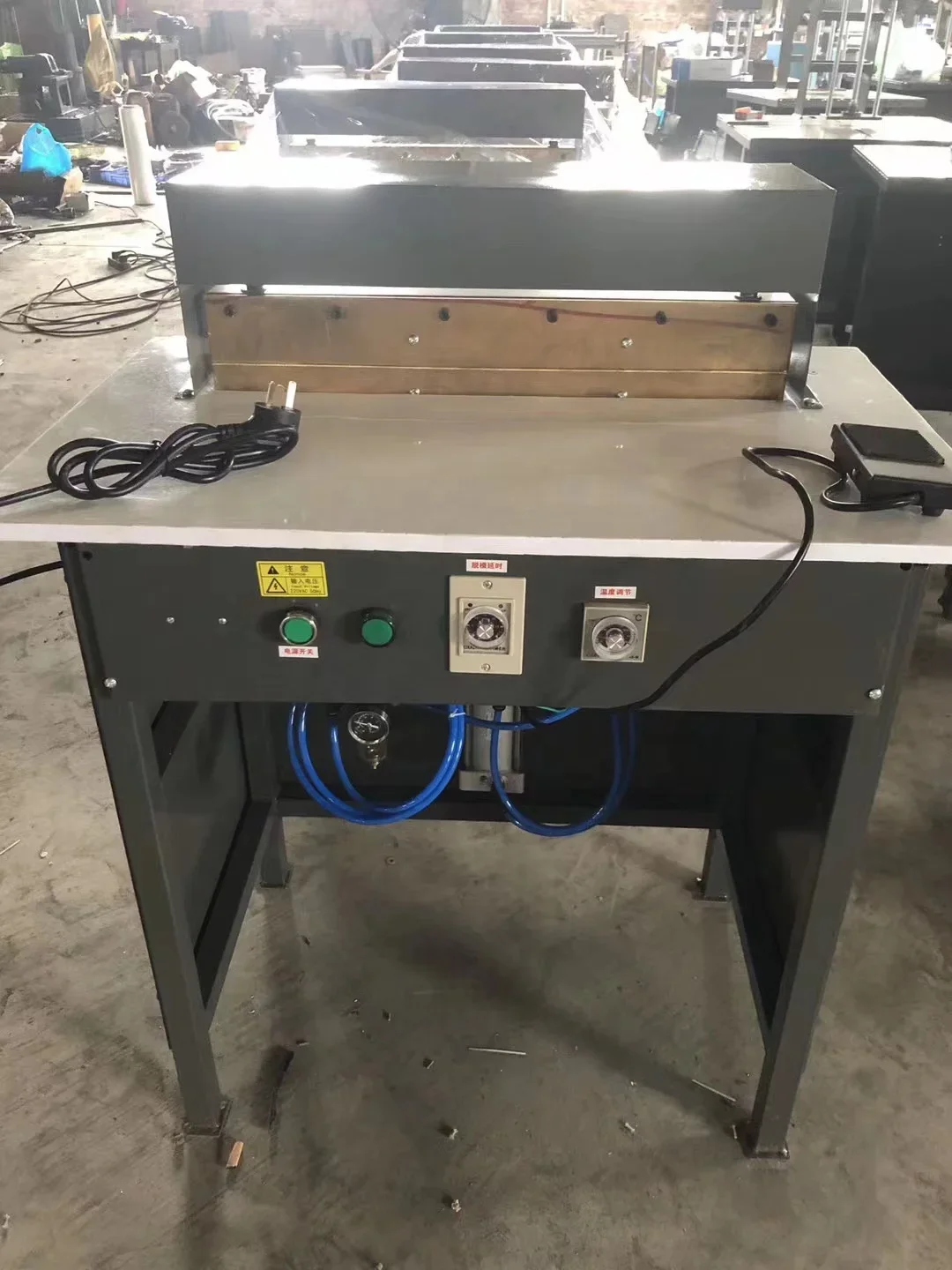 Pneumatic hardcover book slotting machine