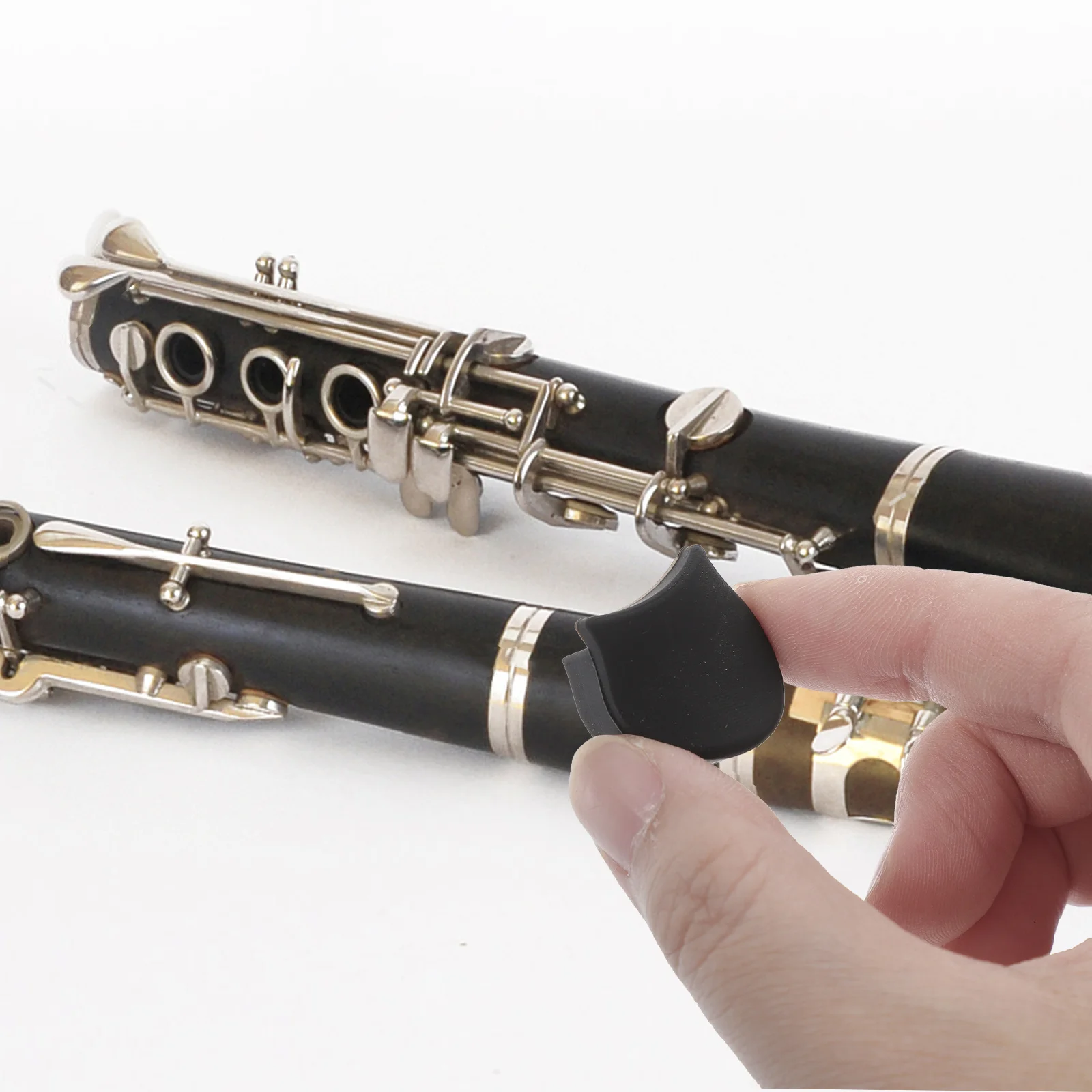

4 Pcs Silicone Clarinet Thumb Rest Protective Cover Instrument Playing Finger Black Cushions