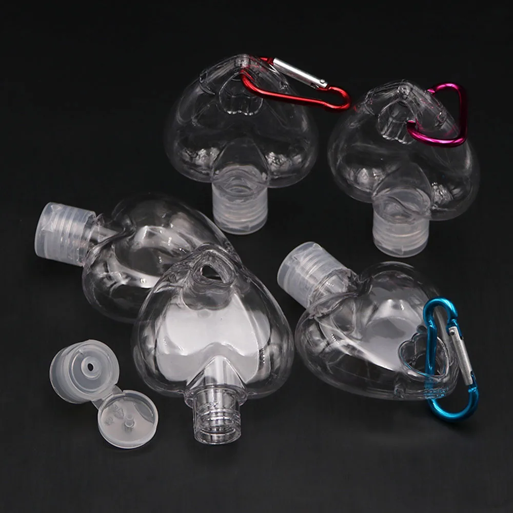 High Quality Transparent Empty Heart shape With Key Ring Cosmetic Container Refillable Bottle Spray Bottle Hand soap Bottle