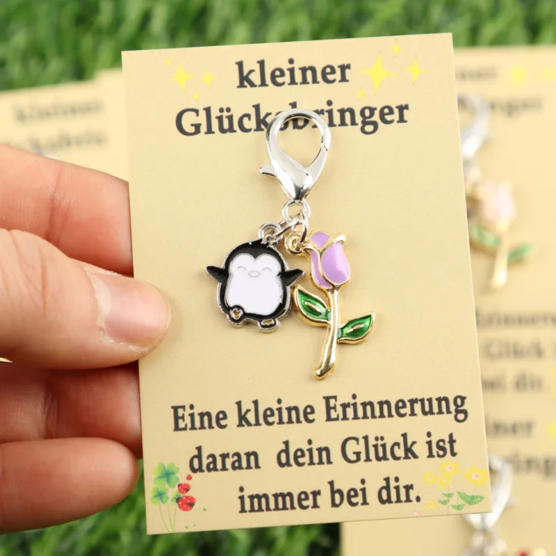 6pcs Cute penguin with tulip flower series keychain set Comes with a small lucky charm card Decorate clothes Versatile bag acces