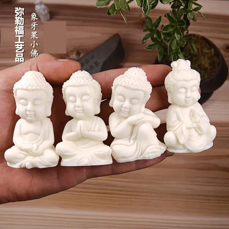 Versione Q in miniatura Cartoon Little Tathagata Buddha Ornamento Tagua dado materiale Intaglio Buddha Artigianato Decorazioni per la casa Oggetti