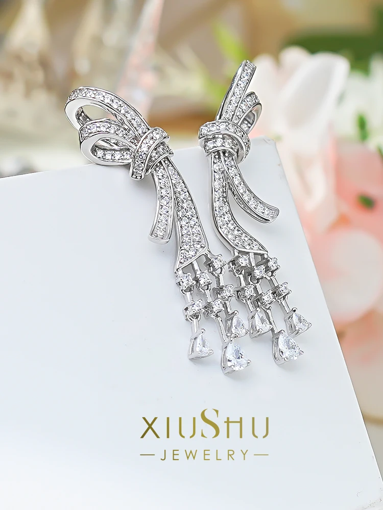 New bow earrings 925 sterling silver inlaid with high carbon diamond light luxury earrings, versatile and niche wedding jewelry