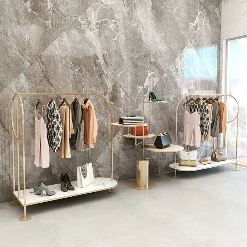 

Custom, Boutique Unique Gold Metal Clothing Display Stand Hanging Rack Shelves with Marble Grain Board