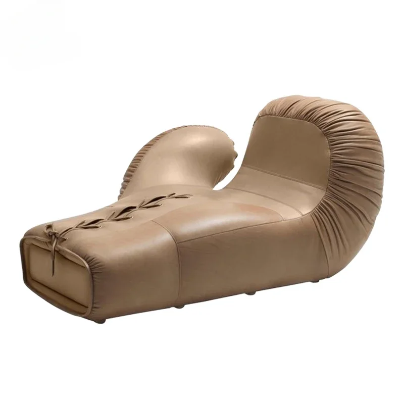 

Designer's fiberglass creative contoured sofa chair, modern and minimalist internet celebrity leather art boxing gloves