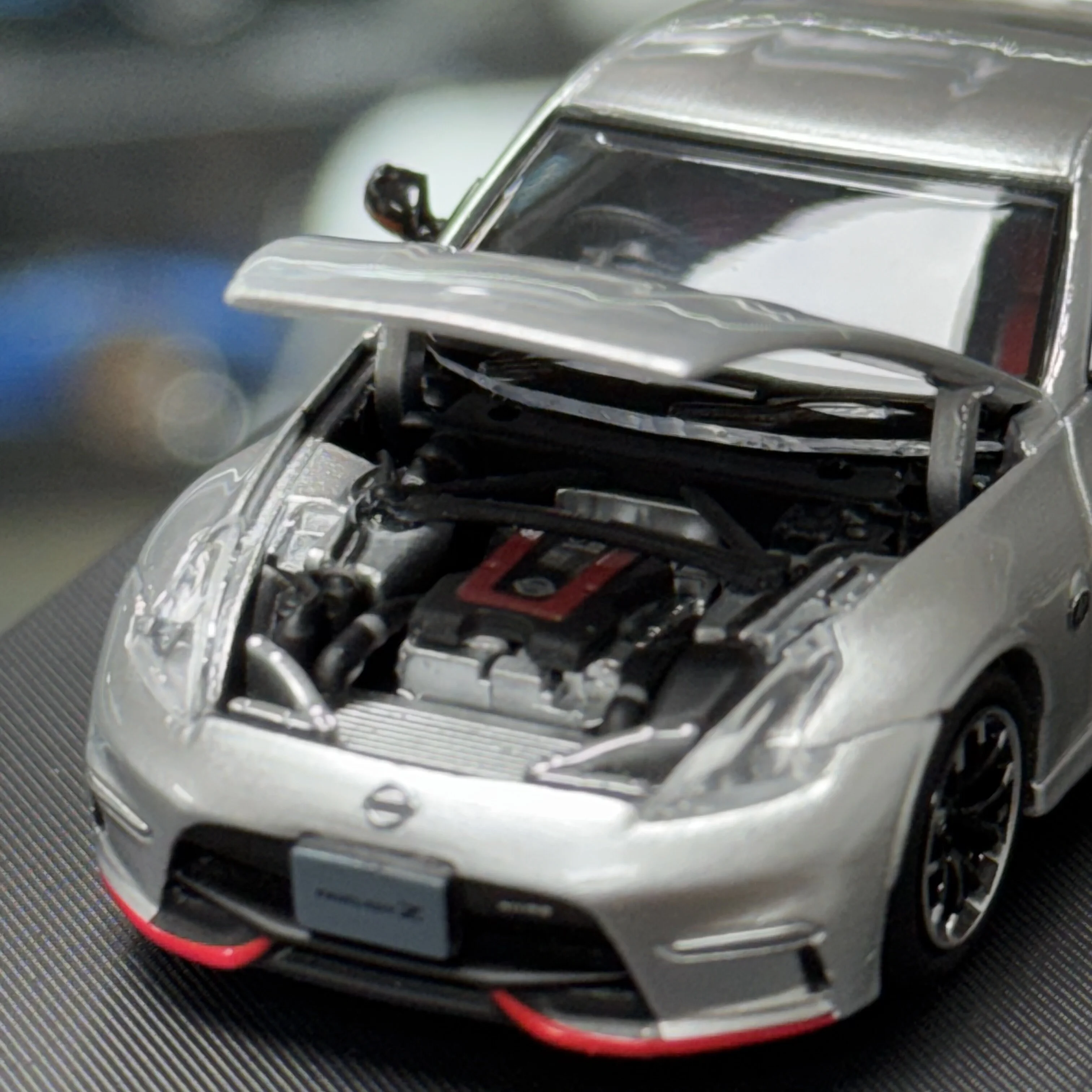 1:64 Fuji, Lady 370z Nismo versión, modelo de coche de aleación con tapa abierta