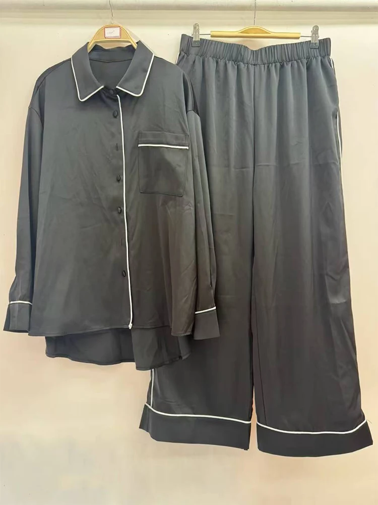 

A two-piece set of two-piece straight-leg shirt with a lapel and a loose wide-leg pants for the autumn of 2025 women's fashion