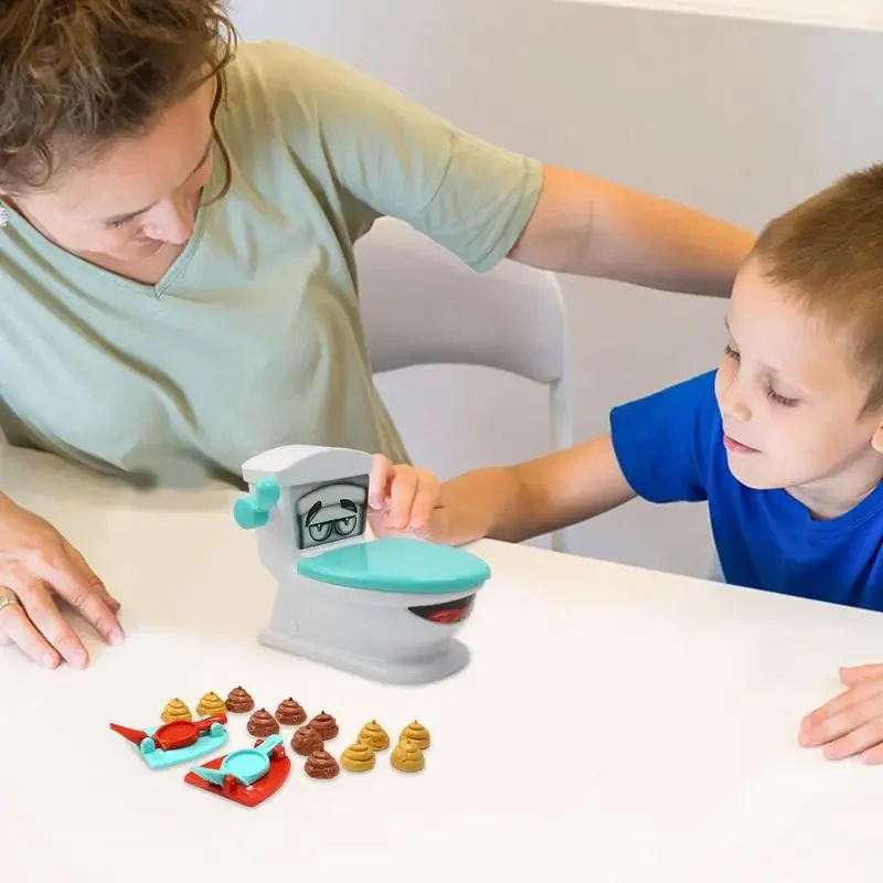 1 Set Nuovo Poop Shooter Giocattolo Divertente Toilette Giocattolo Festa di Famiglia Rilassamento Genitore Bambino Gioco Interattivo Da Tavolo Catapulta Gioco Giocattoli