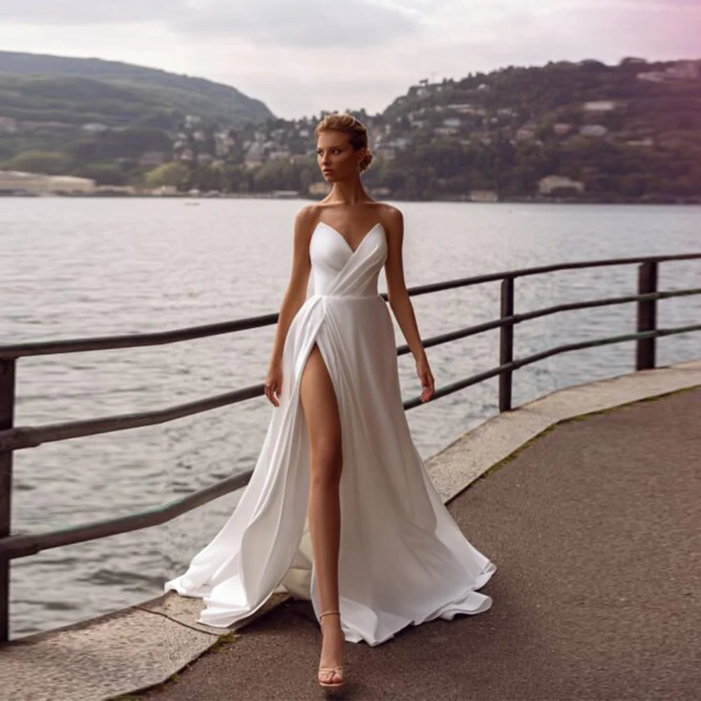 Personnaliser mesures a-ligne sans manches robes de mariée classique princesse Satin longueur de plancher robe de mariée haut côté renversé élégant