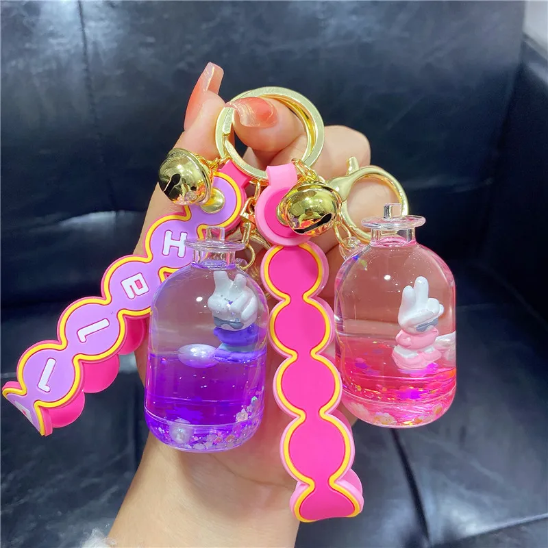 Cute Animal Yeah Gesture Rabbit Warm Pot Floating Bottle Key Chain Cartoon Liquid Pearl Sakura Sequins Quicksand Keyring Pendant