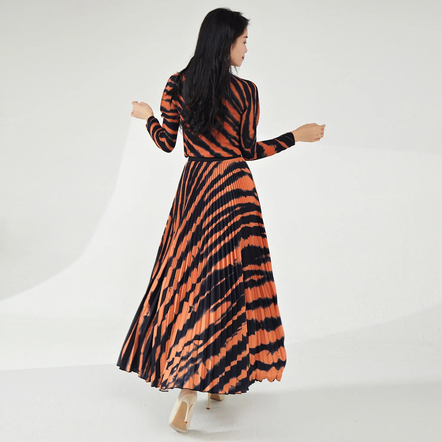 Latest Summer Women's Casual Stretch Striped Top and Skirt Set Fashionable Two-Piece Pleated Set Made of Polyester Fabric