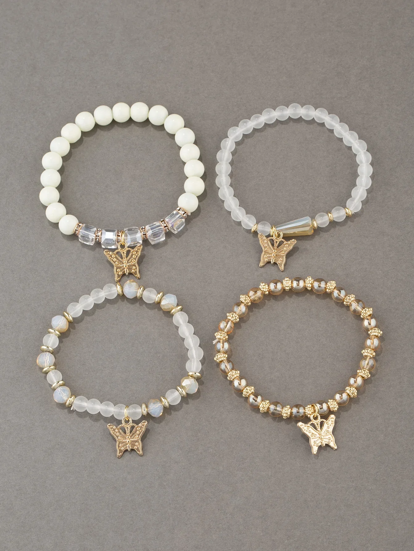 Set da 4 braccialetti da ragazza con ciondolo a farfalla con nappe e