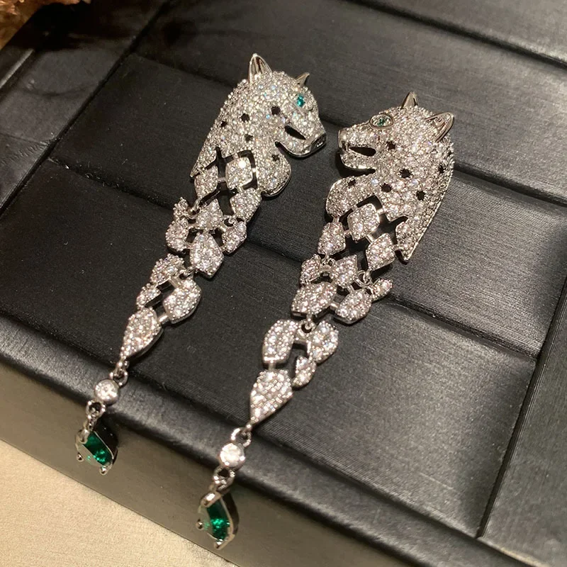 

European and American net red long fringe hollowed emerald water drop earrings