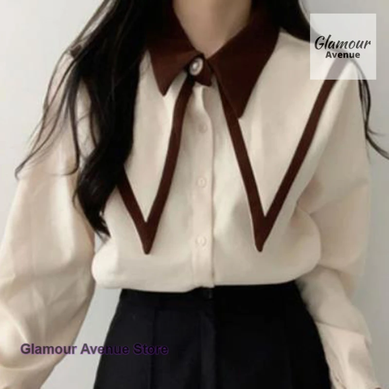 

French temperament contrast edge pointed collar single-breasted shirt women's summer and autumn new loose casual fashion top