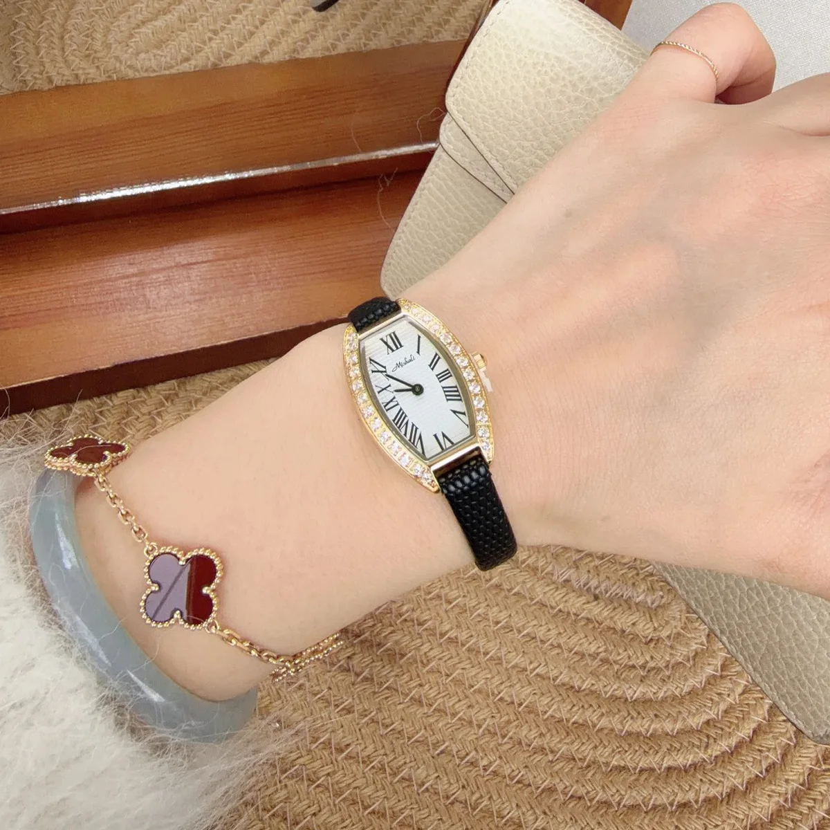 Fashion Ultra Thin Tonneau Quartz Watch for Women with Diamond Studded Leather Strap and Elegant Pin Buckle