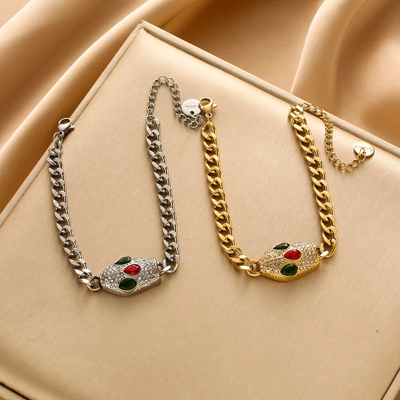 

Женский персонализированный браслет из циркония в форме змеи с инкрустацией цветами.